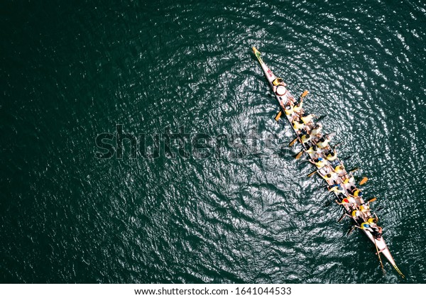 Dragon boat from above.\
Overhead view