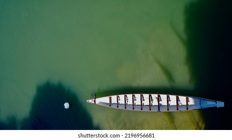                           Dragon Boat On The Green Rhine Waiting For Rowers     