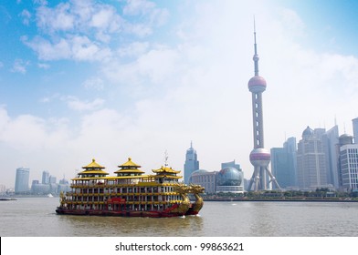 Dragon Boat Through The Shanghai Skyline