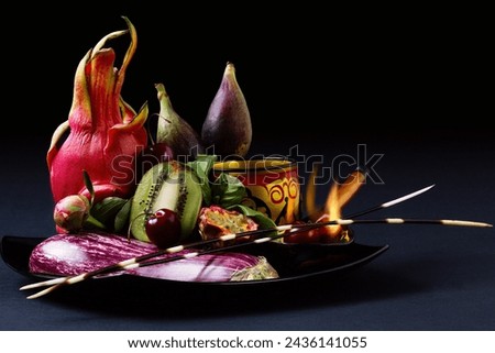Dragon fruit, aubergine and kiwi stylised food design