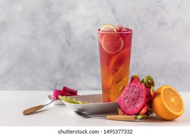 Dragon Fruit Orange Juice Drink On Grey Background