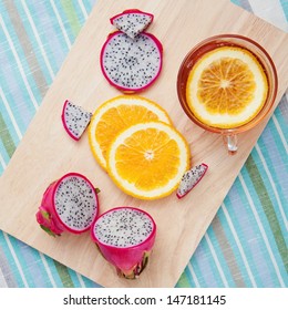 Dragon Fruit And Oranges With Tea On Dessert