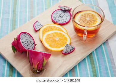 Dragon Fruit And Oranges With Tea On Dessert