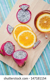 Dragon Fruit And Oranges With Tea On Dessert