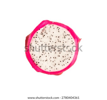 Dragon fruit slice isolated on white background. Pink pitaya cross section with black seeds. Healthy tropical produce for food photography.
