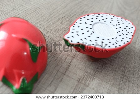 Dragon fruit toys in a room setting