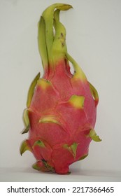 Dragon Fruit In White Background. It Is Pink Skinned Fruit With White Flesh. Dragon Fruit Is Used To Flavor And Color Juices And Alcoholic Beverages.