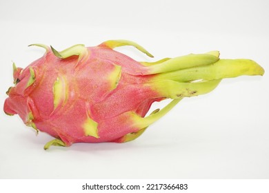 Dragon Fruit In White Background. It Is Pink Skinned Fruit With White Flesh. Dragon Fruit Is Used To Flavor And Color Juices And Alcoholic Beverages.