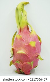 Dragon Fruit In White Background. It Is Pink Skinned Fruit With White Flesh. Dragon Fruit Is Used To Flavor And Color Juices And Alcoholic Beverages.