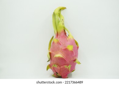 Dragon Fruit In White Background. It Is Pink Skinned Fruit With White Flesh. Dragon Fruit Is Used To Flavor And Color Juices And Alcoholic Beverages.