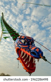 Dragon kites are being flown on Samas beach, Yogyakarta. Kites are a popular game for children by adults - Shutterstock ID 1962286498
