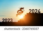 A dragon running up the stairs from 2023 to 2024. 2024 New Year concept. New year