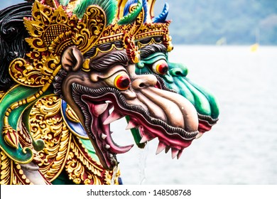 Dragon statue Bedugal temple , lake Braton Bali Indonesia