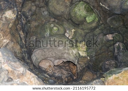Dragons lair with an extraordinary texture. Abstract stone cave as background