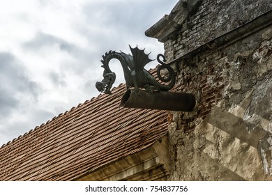 a drain in the form of a dragon's head