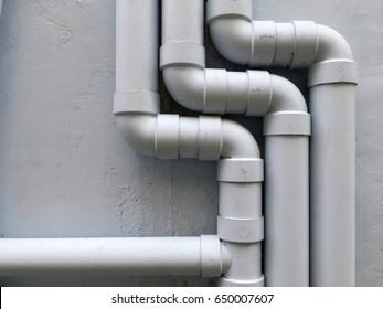 Drain Pipe On Gray Building's Wall