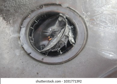 Drain With Saran Wrap