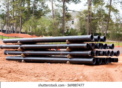 Drain And Sewer Pipes In Dirt At A Residential Construction Site