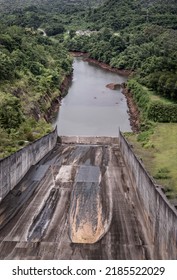 Drainage Channels Of Large Dams In Dry Season The Water Shortage. Landscape Of Empty Reservoir Or Big Concrete Dam, Water Resource Management Concept, Selective Focus.