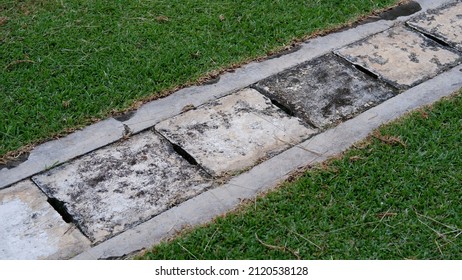 A Drainage System For Storm Water Drainage In Side A Pedestrian Sidewalk