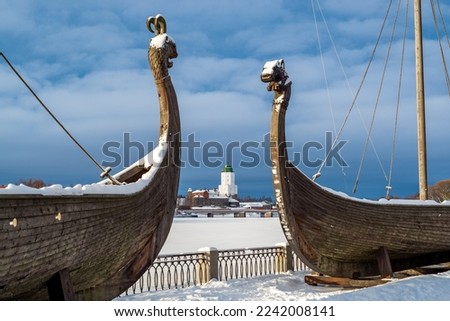 Drakkars (viking ships), medieval Vyborg Castle, Leningrad region, Russia, winter