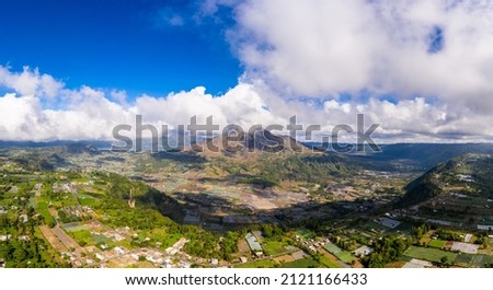 Dramatic aerial panorama of the Batur volcano near Kintamani in Bali central highlands in Indonesia