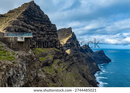 Dramatic aerial view of the Dragon Tail cliffs and Mirador del Balcon on the rugged west coast of Gran Canaria
