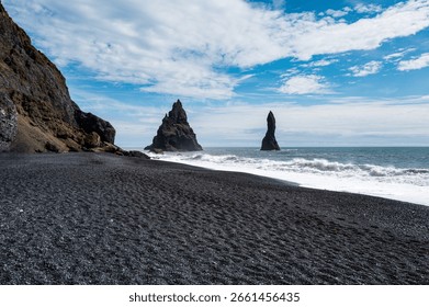 Dramatic Basalt Sea Stacks on Black Sand Beach in Iceland