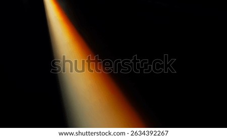 Dramatic Beam of Light Against Dark Background