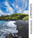 Dramatic Black Sand Beach with Volcanic Rocks and Lush Green Cliffs Under Wispy Cirrus Clouds, Maui, Hawaii, USA
