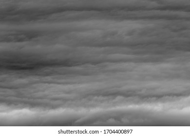 Dramatic black and white cloudy sky. Background. Space for text. Black and white.