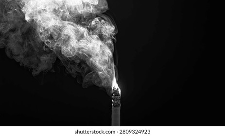 A dramatic black and white image capturing a thick plume of white smoke billowing upwards from a tall industrial chimney, set against a stark black void.