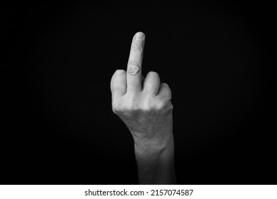 Dramatic Black And White Image Of Middle Finger Emoji Isolated On Black Background