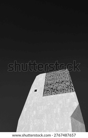 Dramatic black and white photo of the facade of the Barack Obama Presidential Center, Library and Museum in Chicago's Jackson Park on the South Side