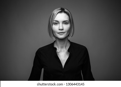 Dramatic Black And White Portrait Of A Beautiful Woman On A Dark Background