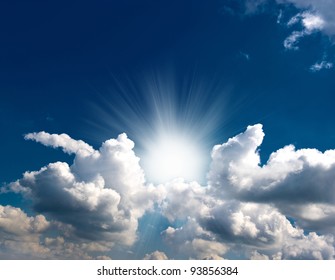 Dramatic Blue Sky With Clouds And Sun Rays