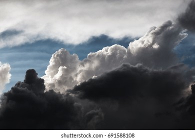 Dramatic Blue Sky With Cumulus Storm Clouds Closeup.