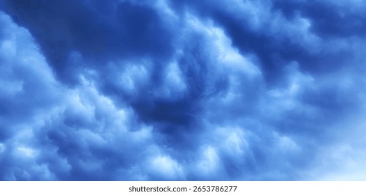 Dramatic Blue Storm Clouds in the Sky. A photo of a dramatic blue sky. Dramatic cloud scene