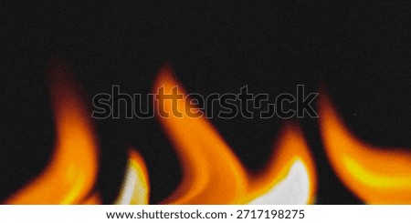 Dramatic blurred fire flames with a gritty film grain noise texture. Vibrant orange heat glowing against dark black background, creating an abstract, atmospheric, and high-energy backdrop
