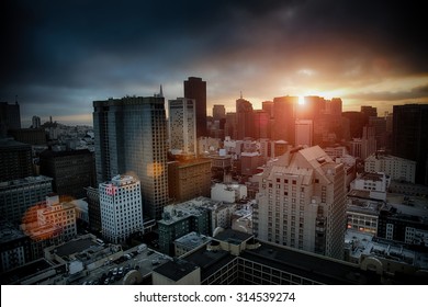 Dramatic breaking dawn over San Francisco with sunlight flare