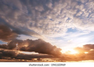 dramatic bright saturated cloudy sunset or sunrise.