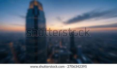Dramatic Cityscape Sunset HighAngle View of Modern Skyscrapers Against Sunset Sky.