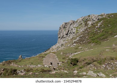Dramatic Cliffs and  Remains of Porthmoina Mill in the Cove at Bosigran by the Atlantic Ocean on the South West Coast Path between Zennor and Pendeen Watch