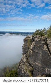 Dramatic Cliffscape: Mountain View with Dense Clouds