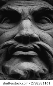 Dramatic close up of ancient Zeus statue face, symbolic image of supreme power, authority and Greek mythology