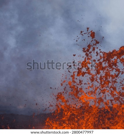 Dramatic close-up of an explosive lava fountain erupting from an active volcanic crater, showcasing glowing molten lava, volcanic explosions, intense heat, and powerful geological forces. Perfect for geology, natural disasters, earth science, volcanology, nature, environmental, and educational or editorial projects.