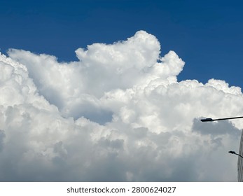 dramatic cloud formation in a clear blue sky