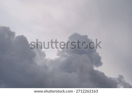 Dramatic Cloud Formation in a Soft, Calm Sky A Mesmerizing Display of Natures Artistry