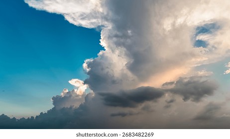 Dramatic cloud formation in vibrant blue sky at sunset