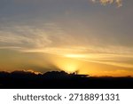 Dramatic cloud formations and colorful sunset skies over Algeria, featuring warm golden light, soft gradients, and atmospheric contrasts. These scenic views highlight the natural beauty of Algerian landscapes, ideal for nature, travel, weather, and background themes.
